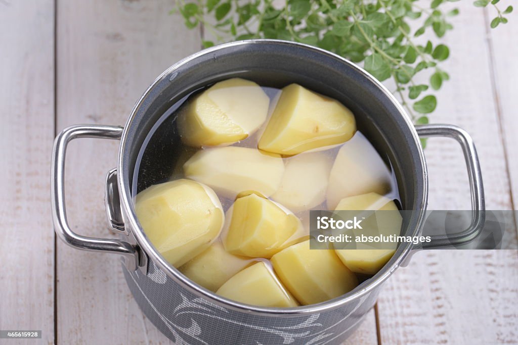 Potatoes in a pot Potatoes in a cooking pot Boiling Stock Photo