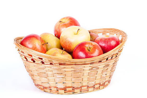 istock Wicker basket with ripe apples on white 465619806