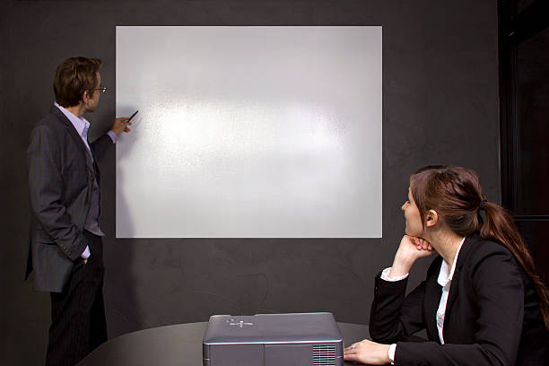 istock Business Staff in a Conference Room With a Blank Screen 465620985