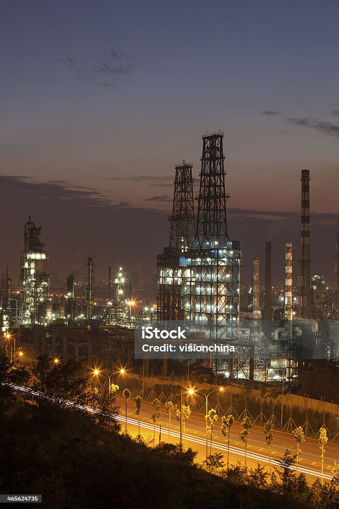 refinery nightshot refinery at night in the China Air Pollution Stock Photo