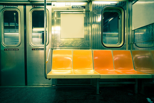 Vintage toned image of empty New York City subway car