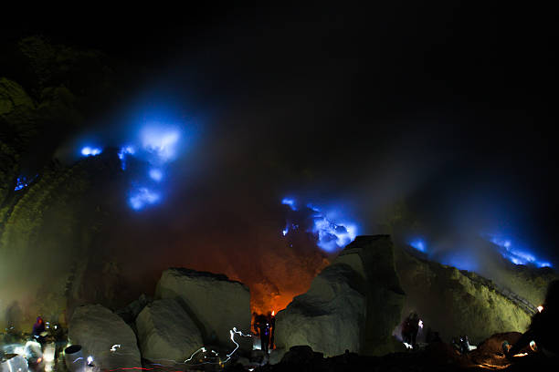 istock Sulfur mining at Kawah Ijen volcano in the night 465625470