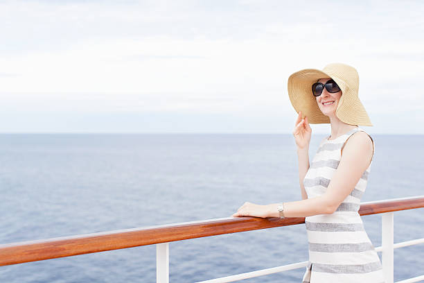 istock woman at cruise ship 465628462