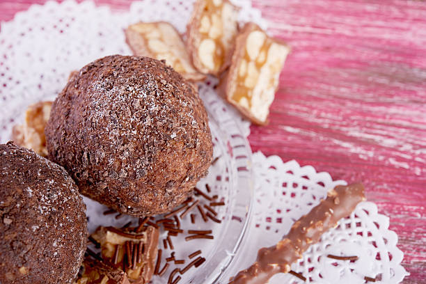 istock Cupcake with chocolate on wooden background 465628668