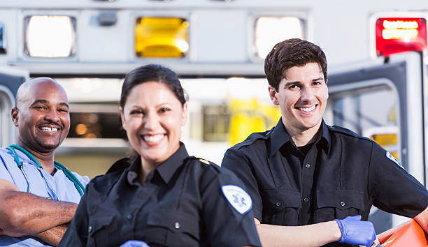istock Paramedics and doctor outside ambulance 465630615