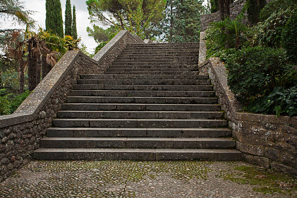 Old stone stairs in the park rises