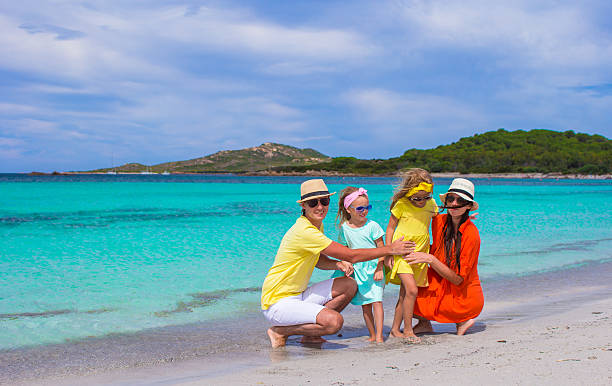 istock Happy family during summer beach vacation 465631990