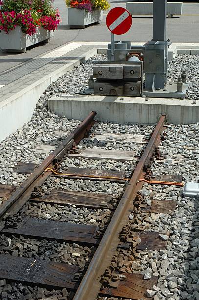 istock Buffer stop at the end of railway tracks 465633050