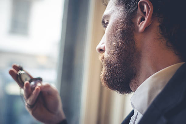 istock handsome hipster elegant man with pocket watch 465633965