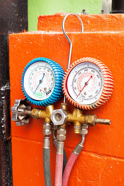 istock Gauge Hang on Orange Wall 465636137
