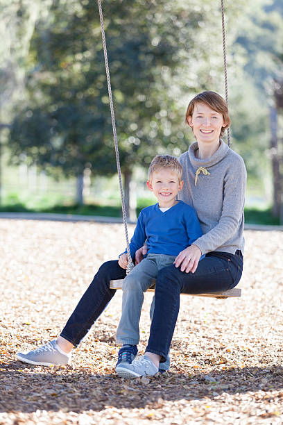 istock family at swings 465636498
