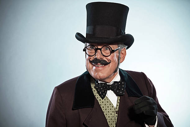istock Vintage dickens style man with mustache and hat. Wearing glasses. 465638281