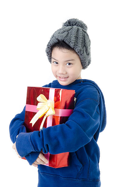 little asian cute boy with gift box stock photo