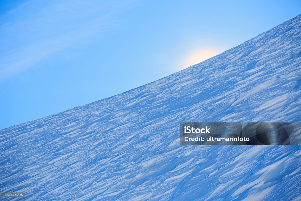 Fresh snow on the top of Alps Mountains Fresh, powder snow on the top of Alps Mountains. High mountain landscape. Ski area. European Alps. The grain and texture added. 2015 Stock Photo