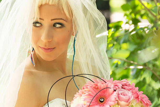 istock Young blue eyed bride looking away. 465650443
