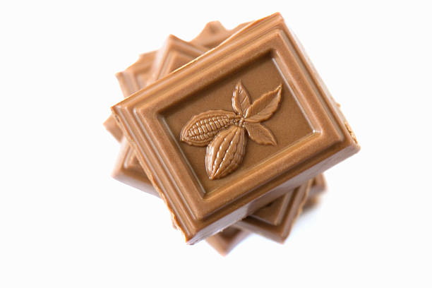 milk chocolate from cocoa beans close-up on white background