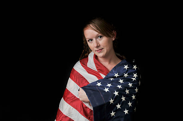 istock Woman Wrapped in a Flag 465654961
