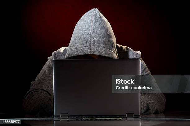 Hacker With Laptop Stock Photo - Download Image Now - Adult, Adults Only, Black Color