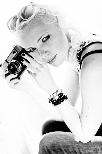 istock woman photographer with camera 465656873