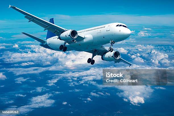 Jet In Flight Stock Photo - Download Image Now - Air Vehicle, Airplane, Blue