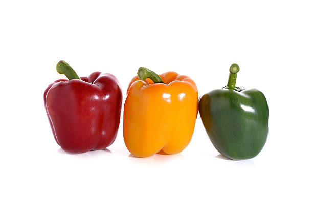 red yellow green bell pepper isolated on white background
