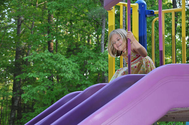 istock Girl on Slide 465658703