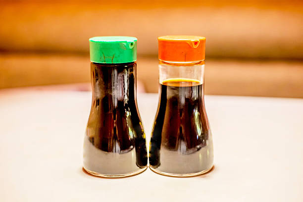 соевый соус бутылки - shoyu стоковые фото и изображения