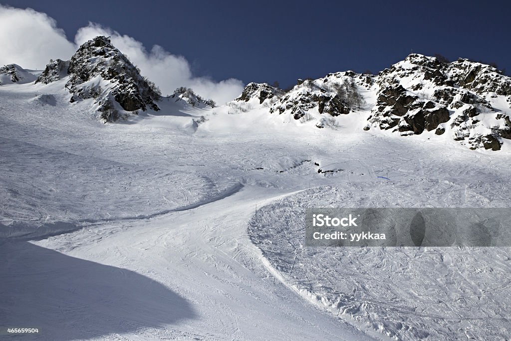Mountain skitrack on the slope Mountain skitrack on the slope. Rosa Khutor Alpine Resort in Sochi. Russia. 2015 Stock Photo