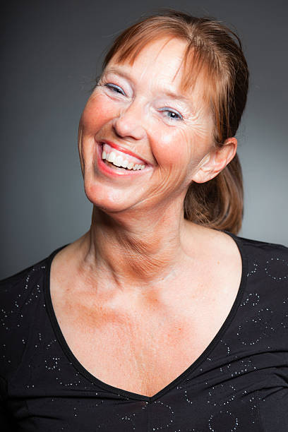 istock Happy spontaneous woman. Studio shot. 465664929