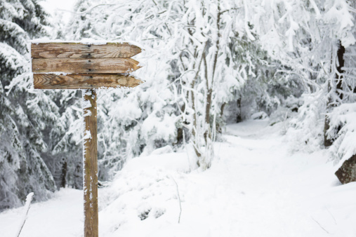 sign on winter trail