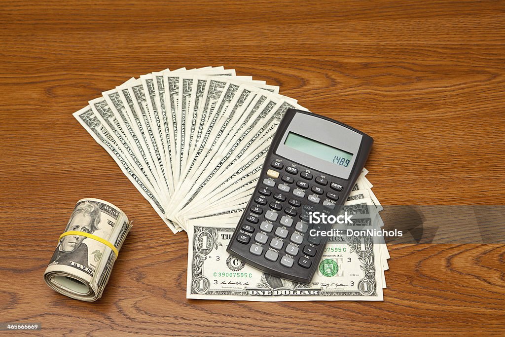 Finanzielle Rechner und Geld - Lizenzfrei 1-Dollar-Schein Stock-Foto