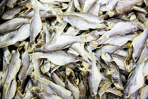 Dried small fish for sale, Hong Kong. Full frame, food background. 