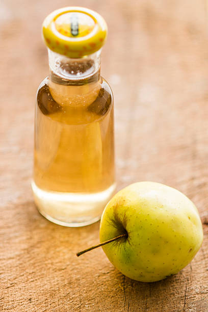 istock Green apple and bottle of juice 465667780