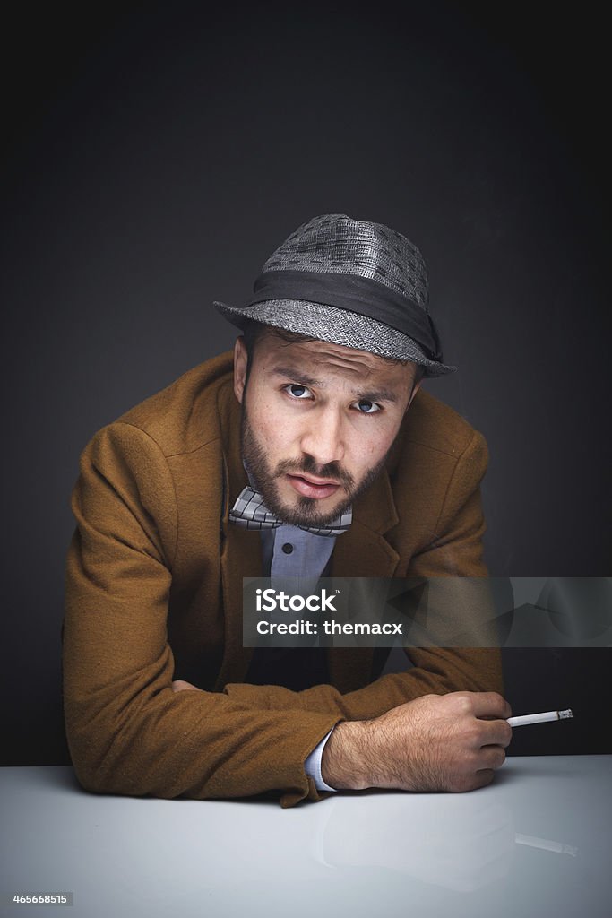 Detective Detective with table. Adult Stock Photo