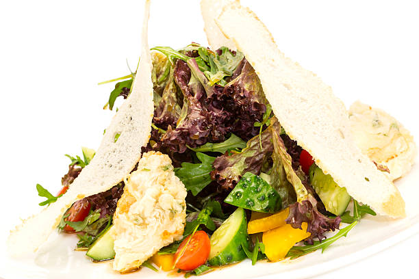 istock salad of fresh vegetables and goat cheese 465668911