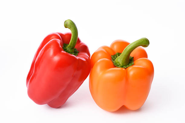 istock Isolated shot of two bell pepper on white background 465670378