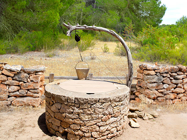 istock Draw well traditional mediterranean masonry 465671212