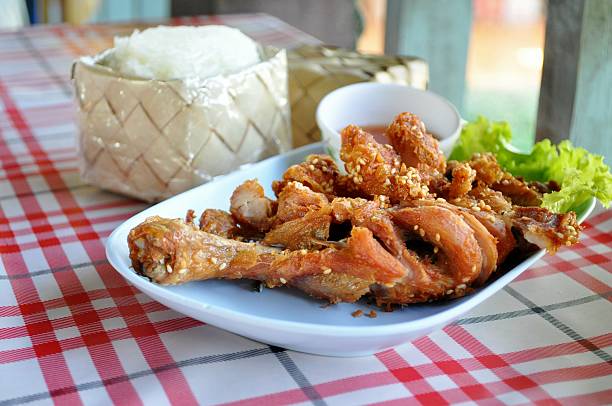 istock Thai style fried chicken with sticky rice 465677937