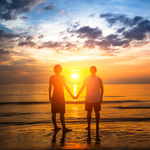 istock Young couple during honeymoon on a tropical beach 465679392
