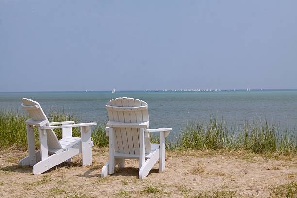 Two Chairs On The Shores of Lake Michigan stock photo