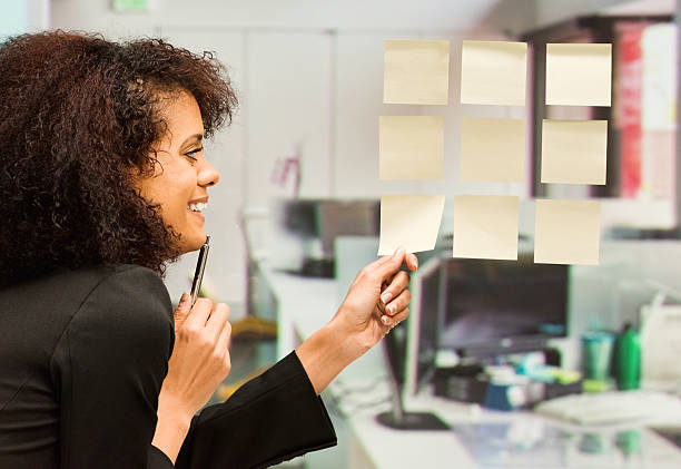 istock Cheerful businesswoman looking at posit 465690146