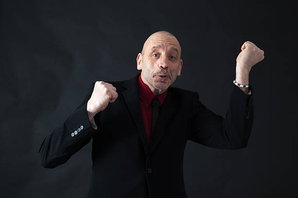 istock Handsome man doing different expressions in different sets of clothes 465690260