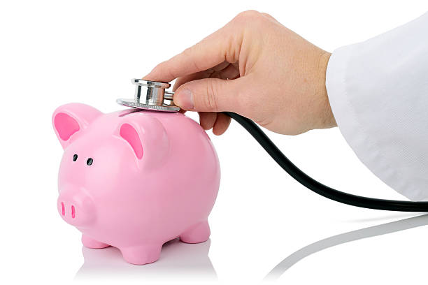 financial check A financial check with a stethoscope isolated on a white background financial wellbeing stock pictures, royalty-free photos & images