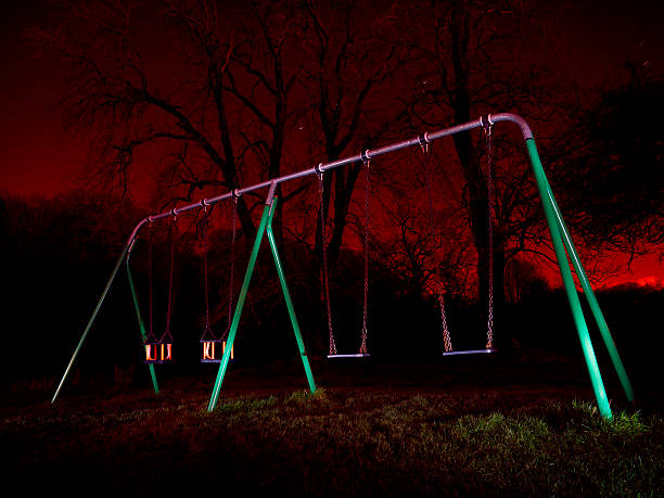 Playground at night stock photo