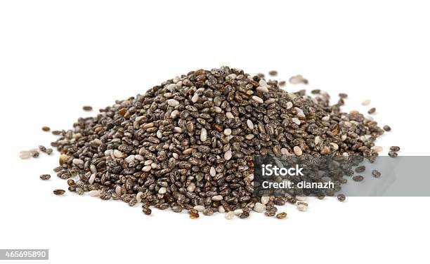 Pile Of Chia Seeds On White Surface Stock Photo - Download Image Now - Chia seed, Seed, White Background
