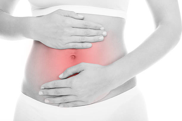 istock Woman Suffering From Stomach Ache 465695925