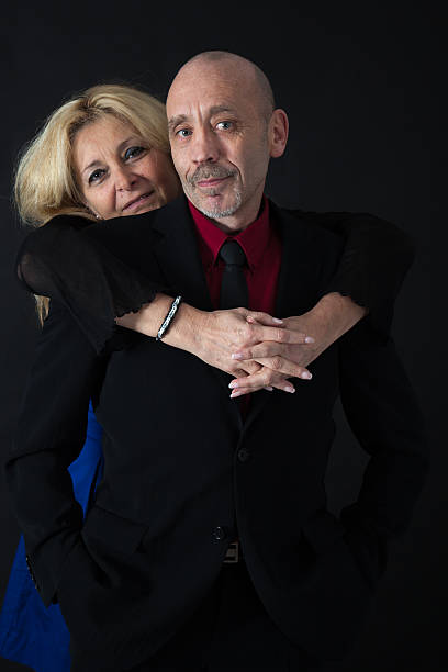 istock Beautiful couple doing different expressions in different sets of clothes 465695944