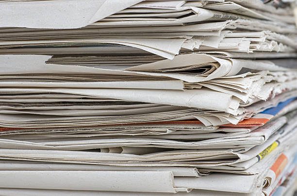 istock pile of newspapers 465696230