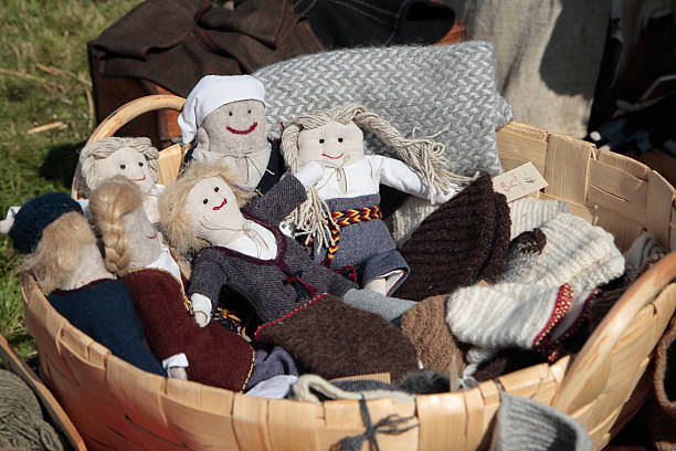 istock Basket of goods Vikings - dolls, knitted mittens 465697321