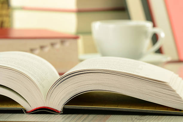 istock Books cup of coffee on the table 465698045